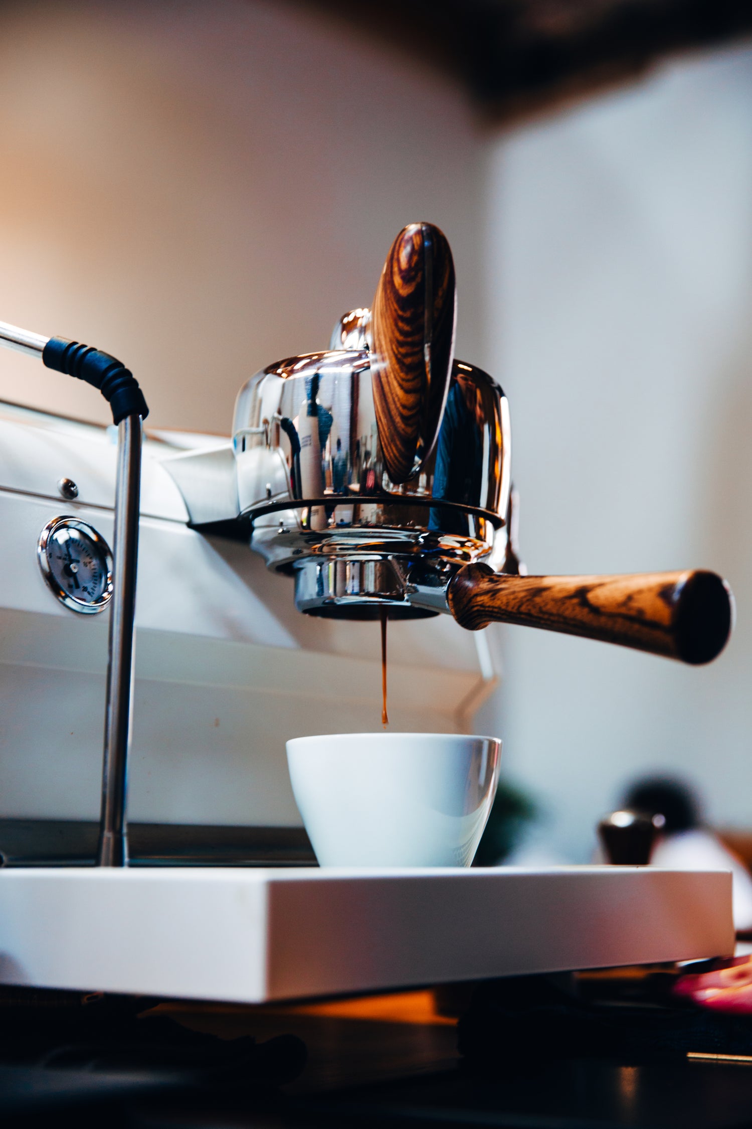 Coffee machine brewing a coffee shot